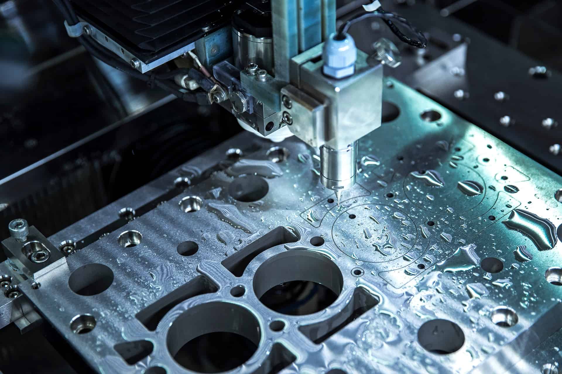 close,up,cnc,milling/drilling,machine,working,process,on,metal,factory,industrial