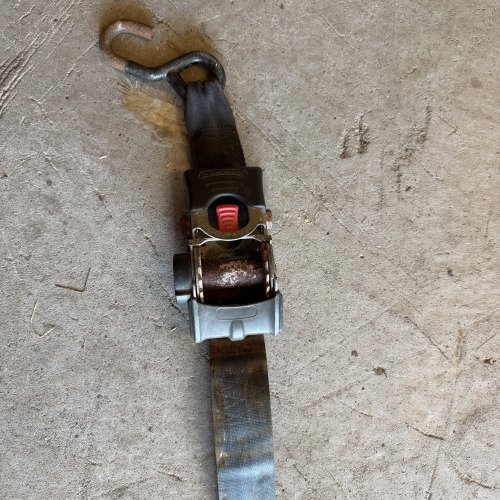 Retractable ratchet strap seized
